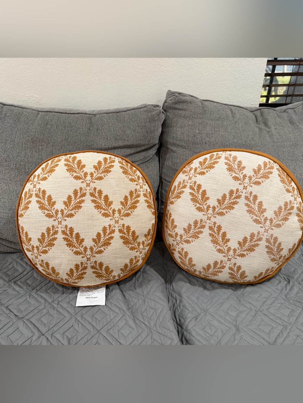 STUDIO MCGEE  golden leaf pattern round throw pillow -yellow/ cream-16"